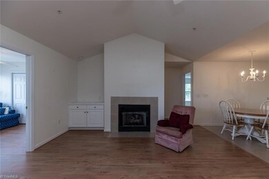Enter the condo and behold the vaulted ceiling. Enjoy the gas logs, and built in storage.