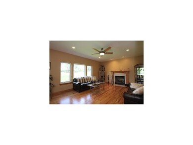 Great Room. Gleaming hardwood floors with cozy gas