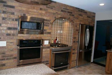 Kitchen. Notice the stainless steel appliances inc