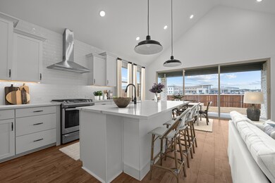 Kitchen with full-height tile backsplash