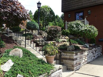 Well maintained lush landscaping both front & rear