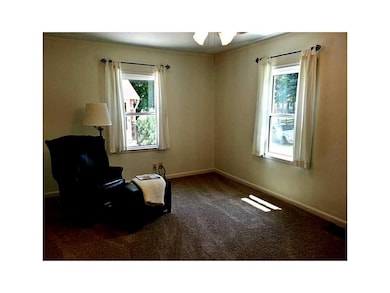 Living Room. All new paint and window coverings.