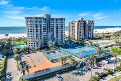 Aerial view featuring a water view and a view of t