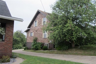 This is a side view of home showing the cement dri
