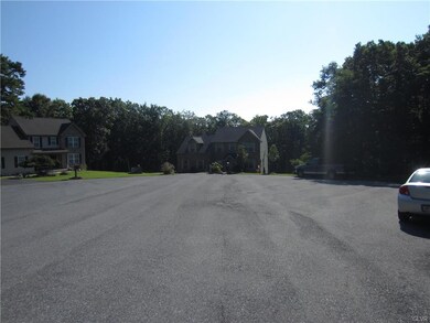 Property in cul-de-sac, to the right by silver car