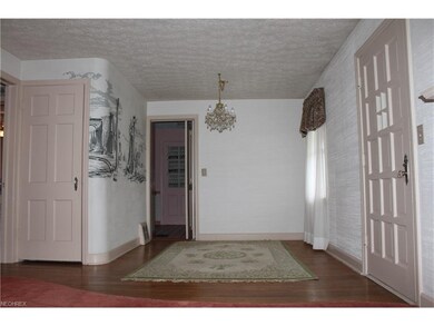 The formal dining room opens to the kitchen. The k