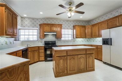 Large Kitchen with an abundance of cabinetry and a