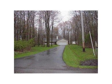 NOTE THE PAVED DRIVE   ALSO HAS TURN AREA BY GARAG