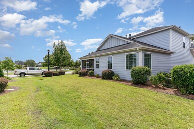 View of property exterior with a yard