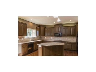 This delightful kitchen comes with all appliances.