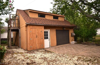 View of garage with loft