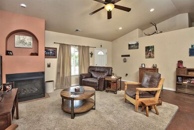 There's a two-sided gas-log fireplace in the livin