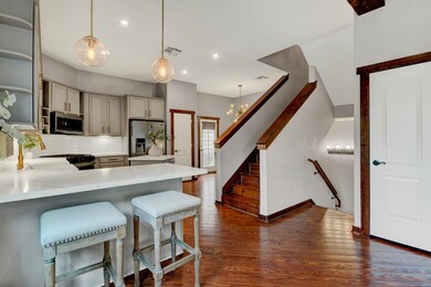 Bright and stylish, the open-concept kitchen featu