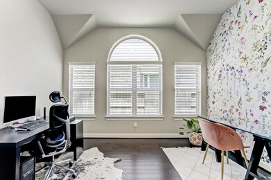 Amazing study features amazing architectural details, gorgeous custom windows, and beautiful new wallpaper. Spacious enough for two work areas and more!