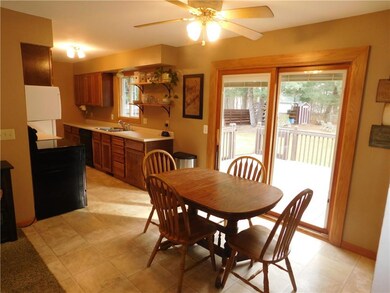 Dining Area With Patio Door Leading to Deck & Backyard!