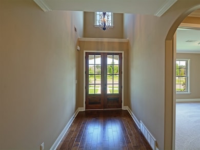 Grand two story foyer for an elegant entrance!  Sc