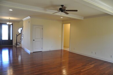 Brazilian cherry hardwood floor flow throughout th
