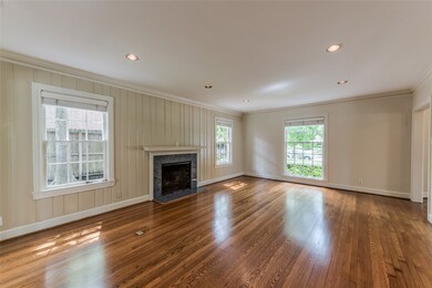 Home is filled with handsome moldings, millwork, trim, wood windows.  Neutral colors throughout; can lights; window blinds.