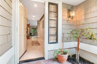 Front Door Entry with Recessed Lights in Hallway