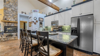 The tall vaulted ceilings are accented by wood bea