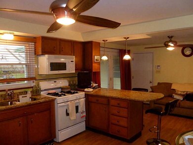 Kitchen. KITCHEN WITH GRANITE COUNTERTOPS, STOVE,