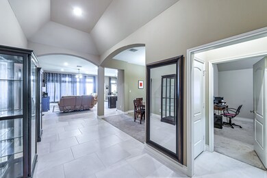 This remarkable home includes high ceilings throughout and astonishing flooring