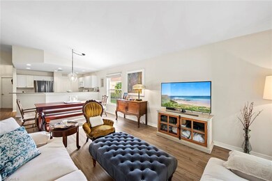 View from master suite hall through great room, di