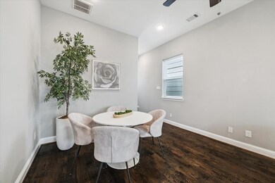 Bright dining area with easy kitchen access—perfect for meals and entertaining.