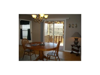 Spacious dining room with sliding door to 2 tiered