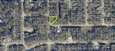 Aerial overview of property's location with property parcel outlined