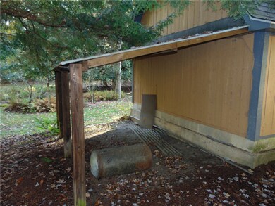 Storage area behind garage