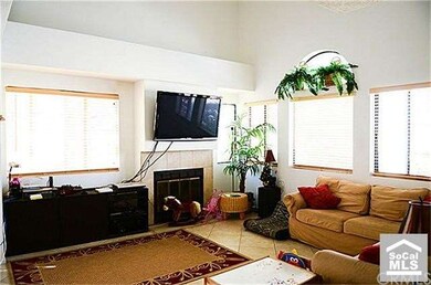 Another view of the LIving Room area w/cozy firepl