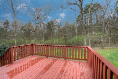 Enjoy this view with no homes immediately behind the home.  A spacious deck and nearly level yard make for great enjoyment.