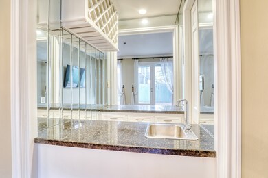 The wet bar provides a convenient connection from