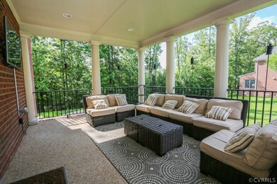 Wrap around Side porch with aggregate, recessed li