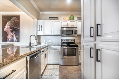 Granite countertops and stainless-steel appliances.