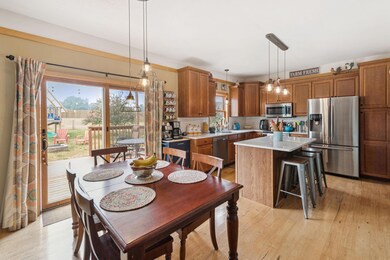 Dining area providing access to the deck outdoors