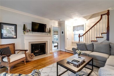 Opens to a cheerful playroom/sunroom.