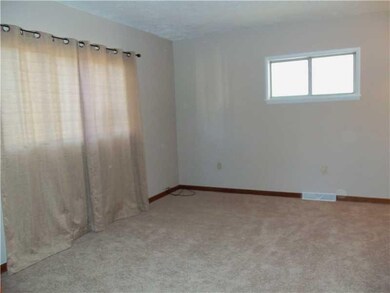 Living Room. All new carpeting throughout