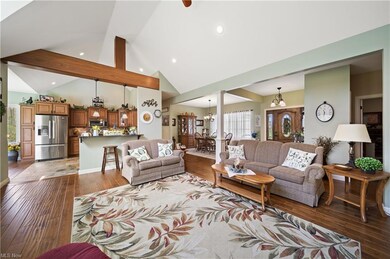 Vaulted Living room 22 x 17 with a wall of windows