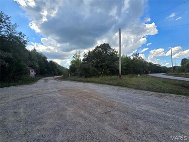 View of street featuring a gated entry