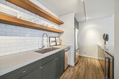 View of the kitchen in Bayou Lofts, featuring the