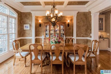 Elegant dining room with coffered ceiling