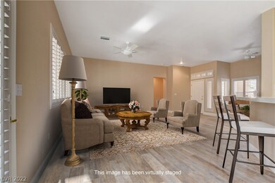 VIRTUAL STAGING OF BREAKFAST BAR AREA LOOKING INTO