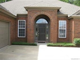 Close up of front porch.  Door and shutters have f
