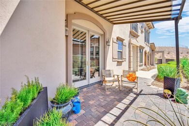 paved wrapped-around patio
