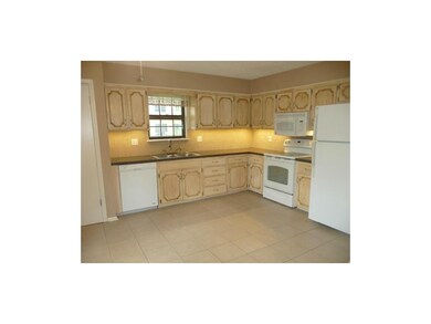 Large kitchen with tile floors, new dishwasher & d