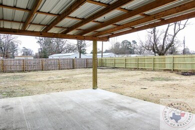 312 Memorial Dr, Wake Village, TX 75501 - photo 6