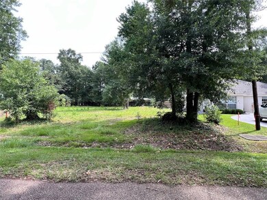 Property stakes on left and right sides of the property