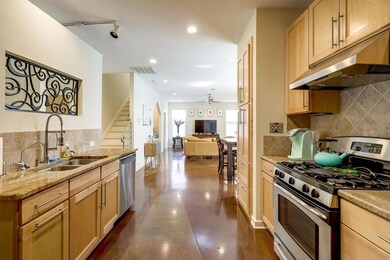 Kitchen featuring appliances with stainless steel